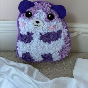 Purple and White Plush Toy